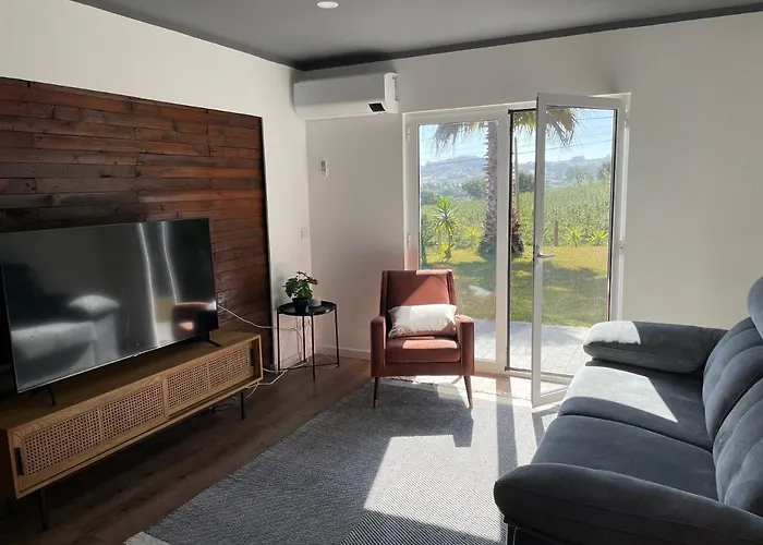 Entre Pomares Casa de Férias